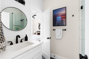 With a sleek mirror and stylish sink, it’s the perfect spot to pamper yourself. 
