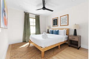 Dreamy vibes only in this cozy bedroom! 🌙✨ With a plush queen bed perfect for snuggling, a soothing ceiling fan to keep the air flowing. 
