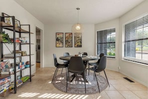Dining area can seat up to 8, additional chairs are at the desk and makeup vanity area in the master. A 6' folding table and 6 additional chairs are in the garage if needed.