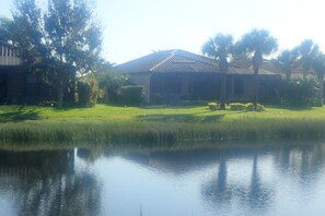 back of home,  on a pond with wildlife