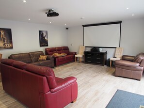 Cinema room large screen projector,  PS4,  dvd player and surround sound