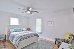 Comfy queen beds in all three rooms, complete with TV’s