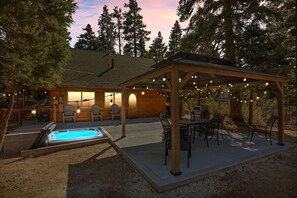 Brand new gazebo with outdoor seating, and in ground spa for you to enjoy during your stay.