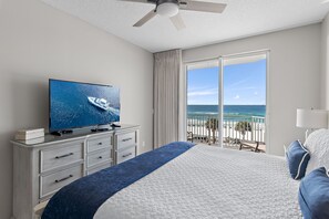 Big Gulf views from the primary bedroom which features a King Bed, new furniture, Smart TV, large closet, and private bathroom with dual vanity