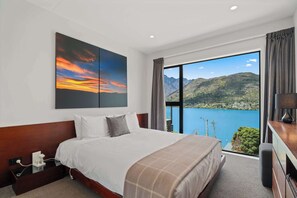 The 2nd bedroom is very comfortable and stylish with incredible views through the floor to ceiling window!
