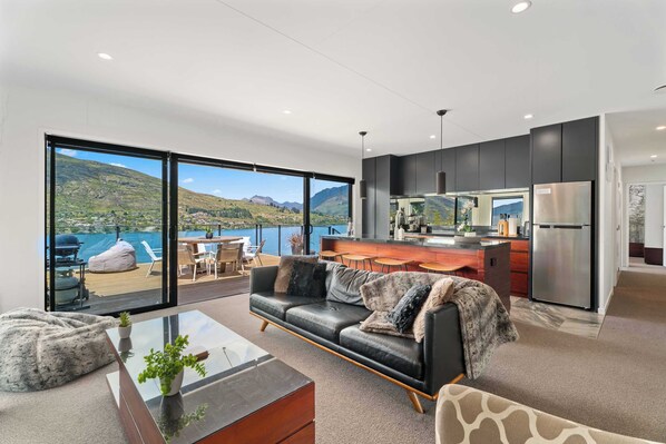 Stunning views of Lake Wakatipu and the surrounding mountains from the fabulous living room, kitchen and huge deck!