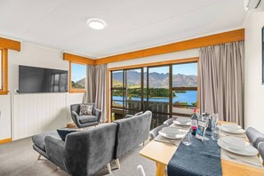 Sit back and enjoy the fantastic views of Lake Wakatipu and the Remarkables Mountain range.

Please note... from late January 2023 onwards, there will be a glass panel in front of the sliding doors, preventing you from walking outside.