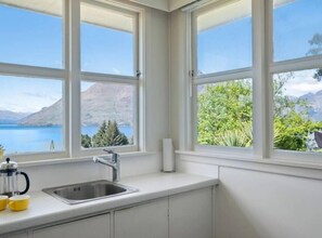 Fantastic views of Lake Wakatipu and the Southern Alps mountains from the kitchen.
