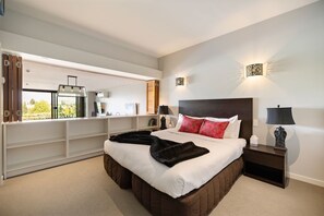 Main bedroom with views over the living and dining areas