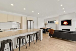 Spacious kitchen with open living and dining areas