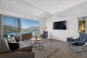 The living room opens up to amazing scenery