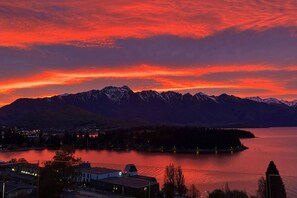 Another incredible sunrise over the Remarkables Mountains and Lake Wakatipu, as seen from our house.  

There was no filter used in this photo. It really looked like this.