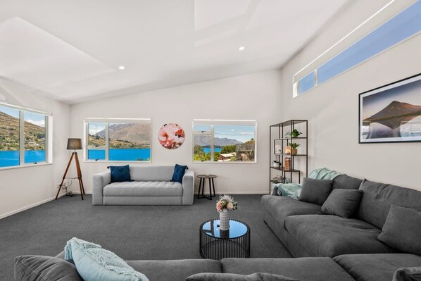 Relax on the huge sofa whilst watching the colours change over the mountains!