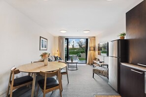 Open plan living, dining and kitchen areas