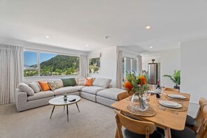Beautiful large open plan living with huge windows and a lovely balcony.