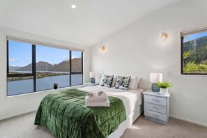 Large master bedroom with king bed which can split into two singles. 