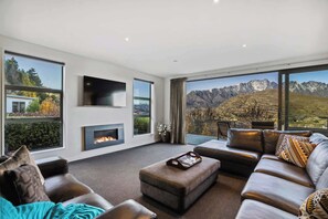 Curl up in front of the fire with uninterrupted views!