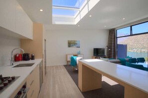 Spacious open-plan living, kitchen, and dining area