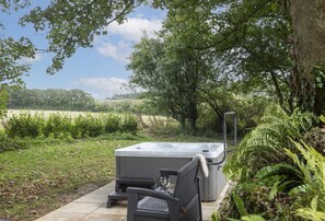 South Lodge, Helston: Encompassed by trees, your private hot tub boasts unspoilt countyside vistas