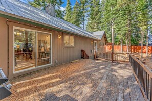 Exterior: Spacious back deck, gas BBQ, wooded backyard