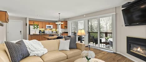 The wall to wall sliding doors provide ample lighting and create a bright and inviting space to relax during your trip to Snowmass