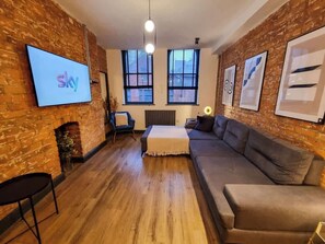 Spacious and stylish, our living room is the perfect place to cosy up, enjoy a glass of wine, or dive into a good book.