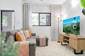 Relax in the living room with a spot of TV. The sofa can convert into a double bed to accommodate two guests.
