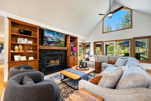 Sink into the plush cushions on the sectional or snuggle into a chair, enveloped by the cozy ambiance of our inviting living room.