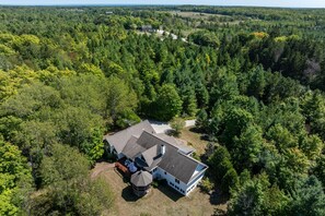 Embrace the full five acres of privacy, serenity and peacefulness of Birch Grove.