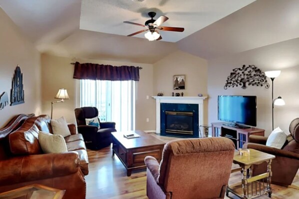 Spacious Living Room with Gas Fireplace, Sleeper Sofa and SMART TV with Cable & WIFI throughout vacation rental