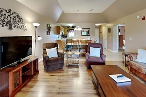 Spacious Living Room with Gas Fireplace, Sleeper Sofa and SMART TV with Cable & WIFI throughout vacation rental