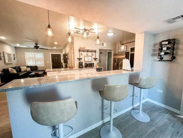Kitchen peninsula provides additional seating