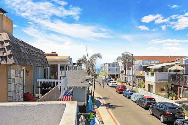 Lounge the day away with partial ocean views on the rooftop deck!