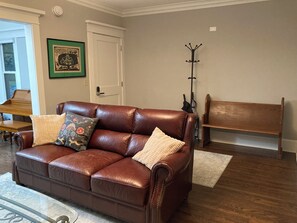As you enter the home there is space to land with coats and belongings