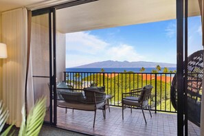Sip coffee on the private lanai, offering stunning ocean views and a serene escape to enjoy Maui's vibrant sunsets and breezy mornings.
