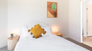 Cozy bedroom with fresh linens provided