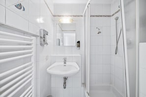 Free towels and shampoo are offered in the shower room.