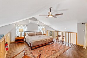 Features a king-sized bed with soft bedding and a ductless heating and cooling system.