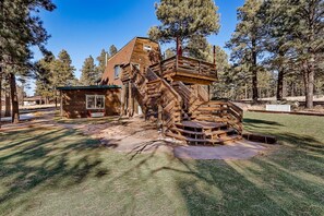 Welcome to Meadow Mountain by Porter! Nestled on 5 private acres with stunning views of Mount Elden