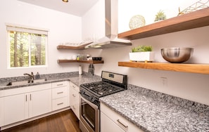 Fully Equipped Chef's Kitchen: Granite countertops, stainless steel appliances, and all the tools needed to prepare and enjoy incredible home-cooked meals.