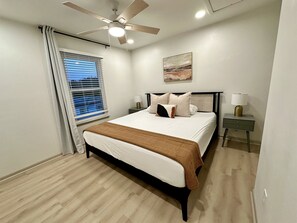Bedroom 2; King bed with Roku Tv