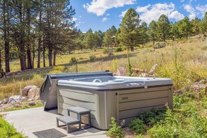 Relax and unwind in your own private hot tub oasis