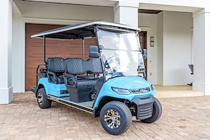 Free 6-seat golf cart included!