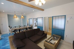 The dining and living areas are connected, creating a spacious and open space.