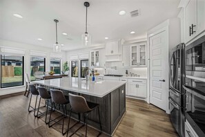Kitchen view with a peek of the backyard.