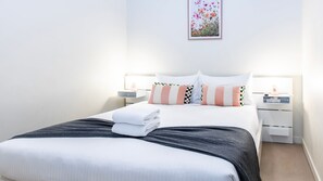 Sleep comfortably in our inviting, tastefully decorated bedroom