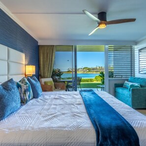 Living room/bedroom of A102 with view of ocean