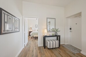 Welcoming entryway with table with inviting "Howdy" sign.