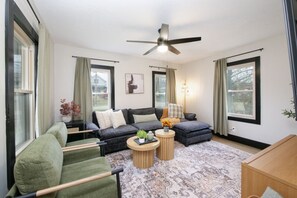 Soft sage greens and warm neutrals create a calming space.  A haven for tranquility.