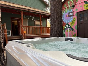 Big Bear vacation rental with hot tub and game room, close to lake, ski resorts, and trails. By Rather Be Properties